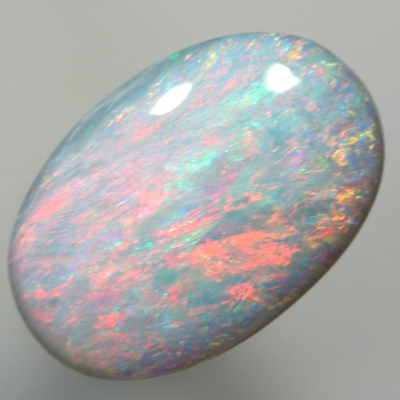 SOLID SEMI BLACK OPAL Colourful display of red over green and blue